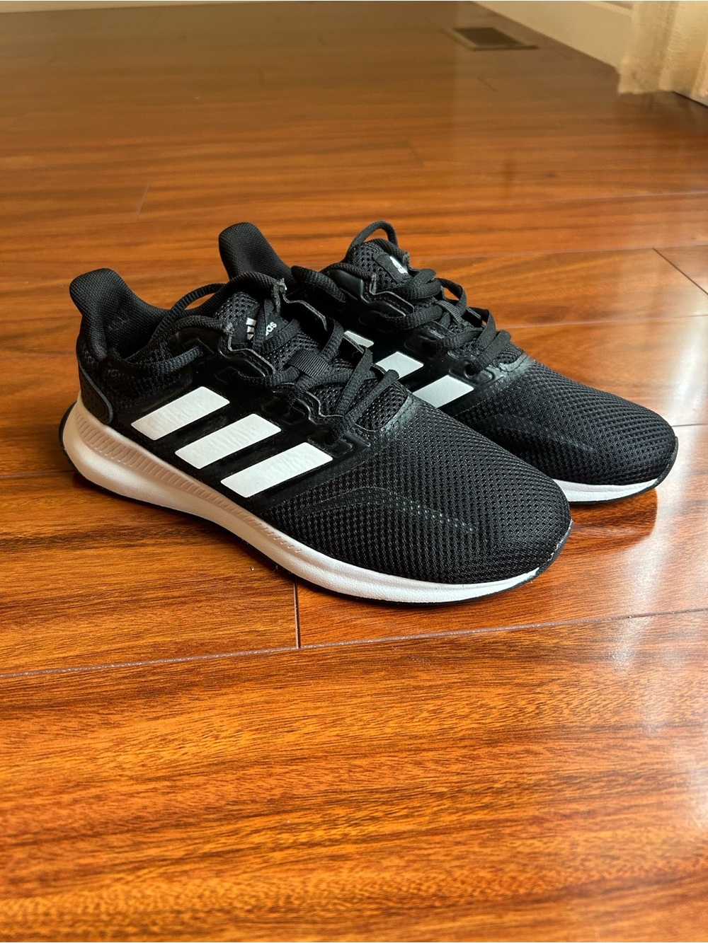 Adidas black tennis shoes size 3